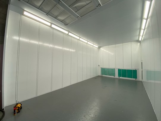 Tall rear extraction spray booth installed by Todd Engineering
